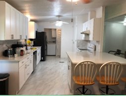 Full kitchen with island seating